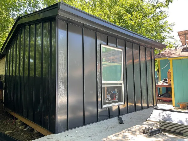 Black standing seam metal wall panels for Metal Roof Installation in Carver